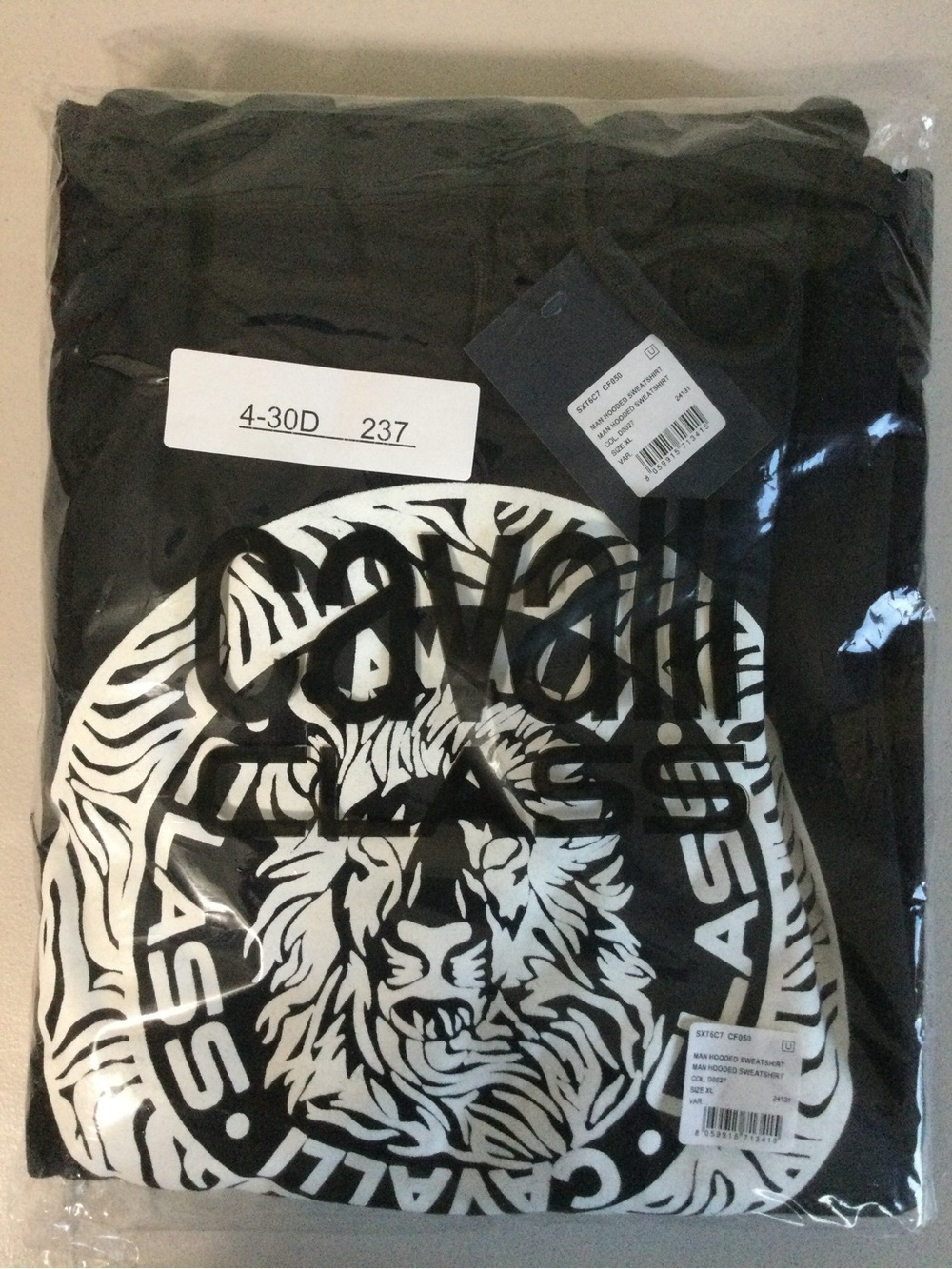 Black Graphic Hoodie with White Lion Crest